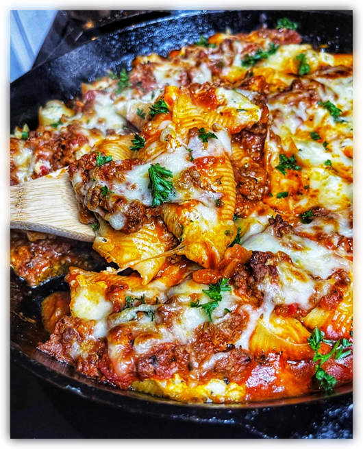 Ricotta stuffed shells with meat sauce